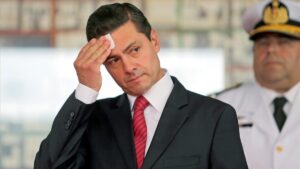 Mexico s President Enrique Pena Nieto gestures during an event  in Asuncion