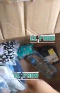 ROJA LA BOTELLA DE AGUA EN LA CAJA (1)