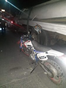 ROJA LA MOTO QUE CONDUCIA