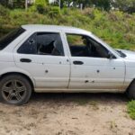 ROJA AUTO EN EL QUE VIAJABA