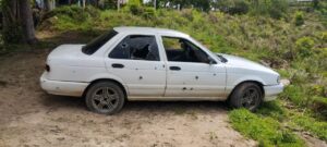 ROJA AUTO EN EL QUE VIAJABA